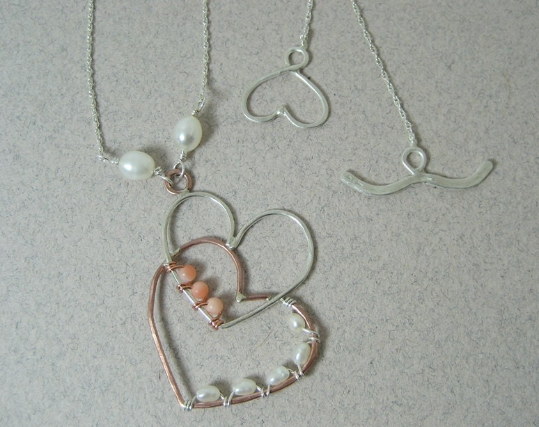 Hammered overlapping beaded sterling silver and copper heart dangle