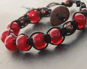 Chocolate Covered Cherries, artisan lampwork yummy red, wrapped in leather bracelet