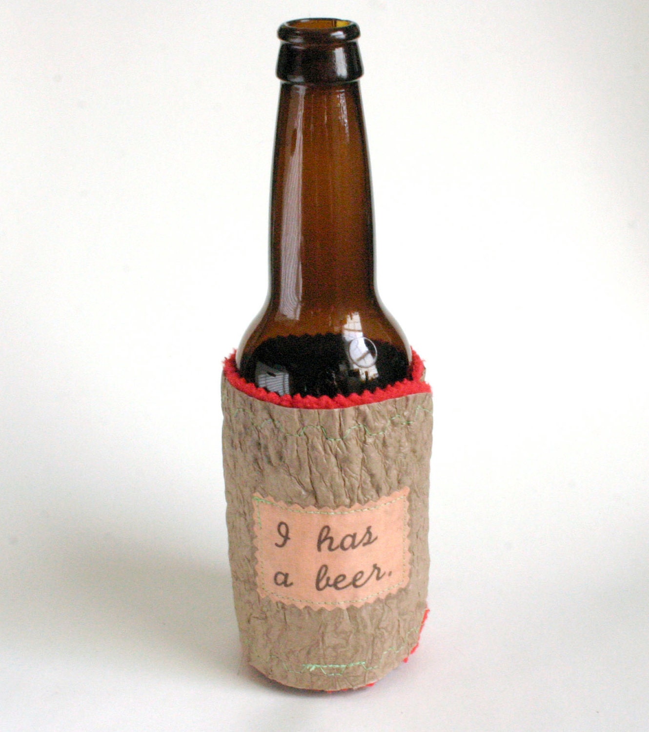 I has a beer Bottle Coozy made from Recycled Plastic Bags