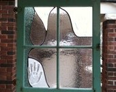 Hands down turquoise window panel