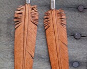 brown leather feather earrings