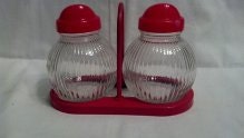 Hazel Atlas Hoosier style salt and pepper shakers with red bakelite tops