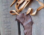 one of a kind leather patch on long leather lace