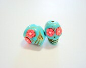 Red Flower Eyes in Small Turquoise Day of The Dead Skull Beads-12mm