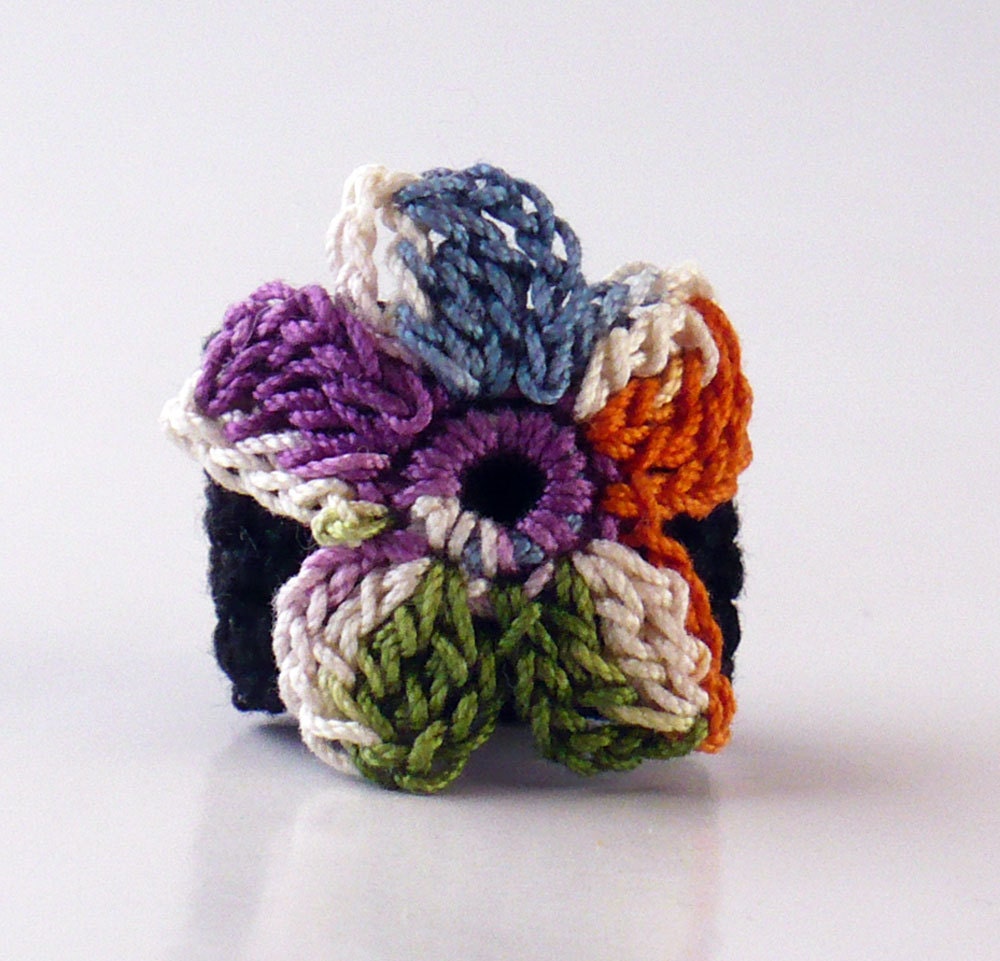 Crochet Ring Flower Applique Indigo Blue Orange Ecru Purple Green on a Black Band