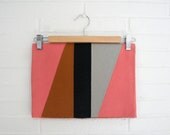 Angled clutch. Salmon pink.