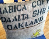 A Little Sunshine pillow, from repurposed coffee sack