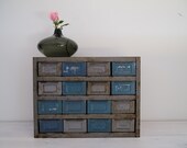 vintage industrial metallic blue and silver metal storage cabinet