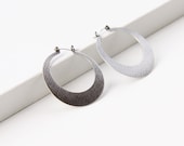 Modern silver hoop earrings, sleek design in crescent moon shape sturdy and lightweight design for everyday wear - "Silver Lunar Hoops"
