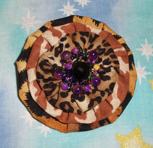 Animal print beaded yo yo flower brooch