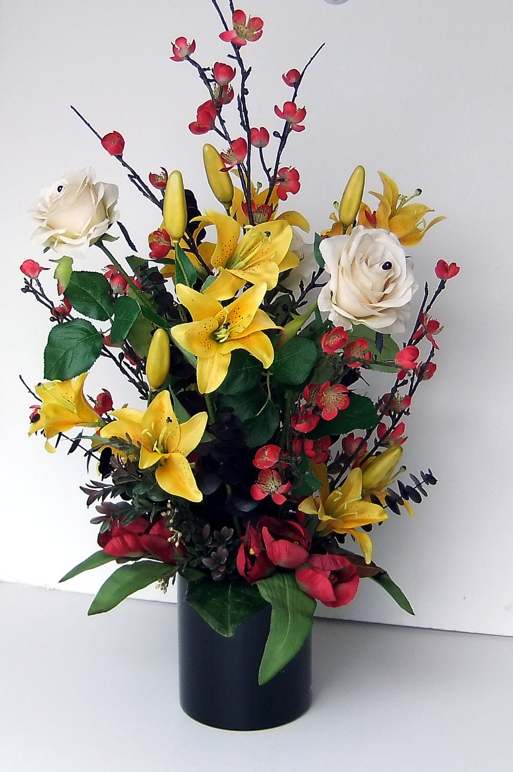 Yellow Daylilies Arrangement in Modern Black Vase