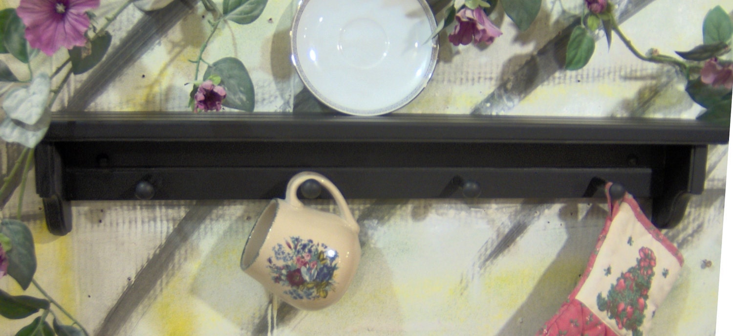 30" black wooden shelf for knik knack, plates  pegs made USA