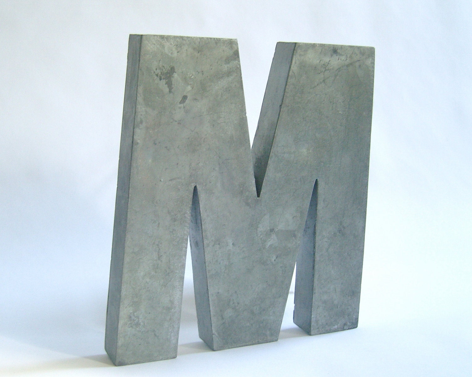 Anthropologie silver, distressed metal letter 