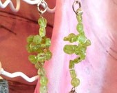 Green beaded dangle earrings with stone beads.
