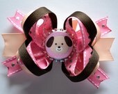 Adorable puppy dog bottlecap hair bow. Pink, peach, and brown.