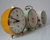 Vintage yellow Peter Repeat alarm clock from Germany