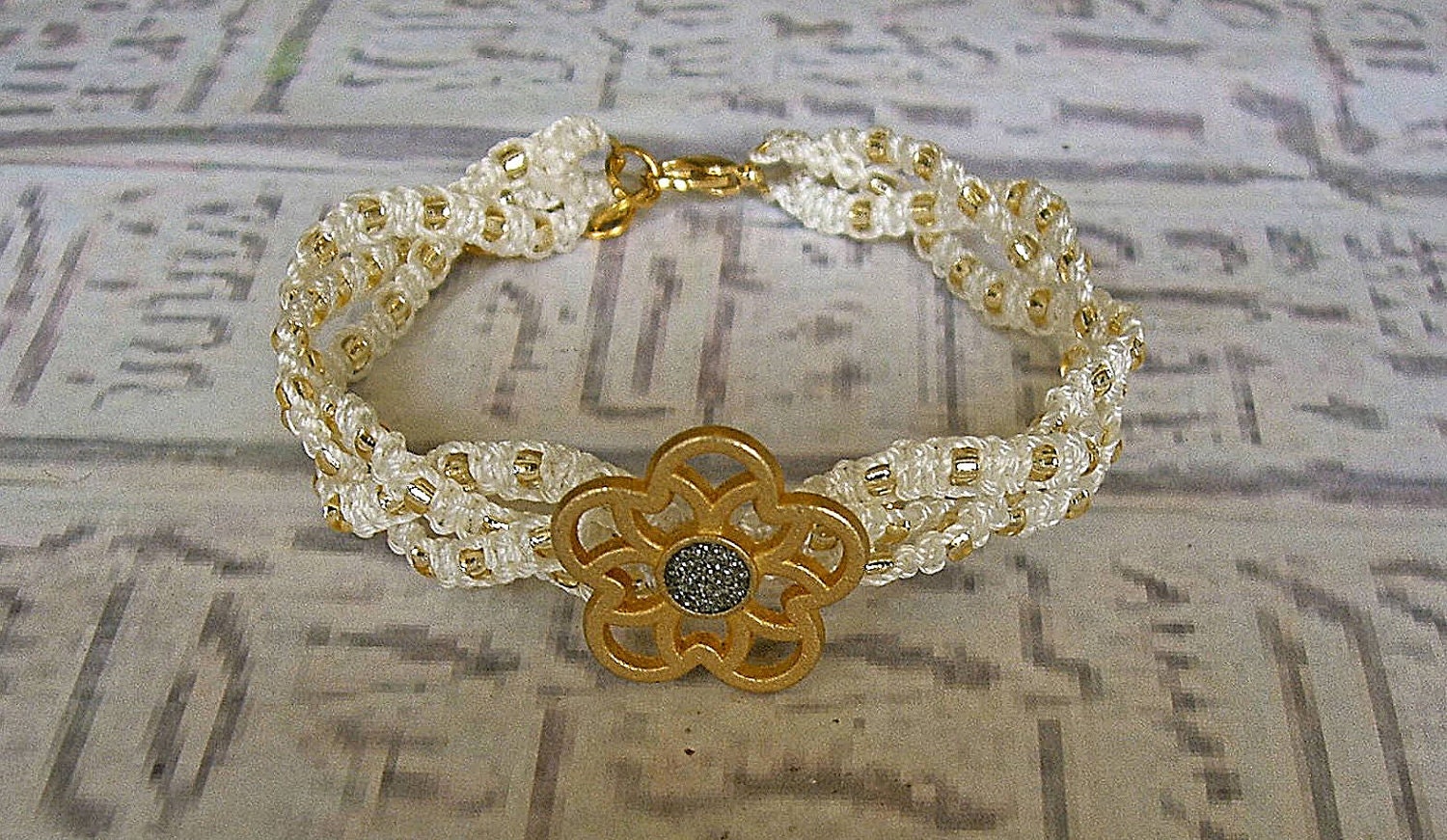Macrame bracelet braided in white and gold. Macrame jewelry.