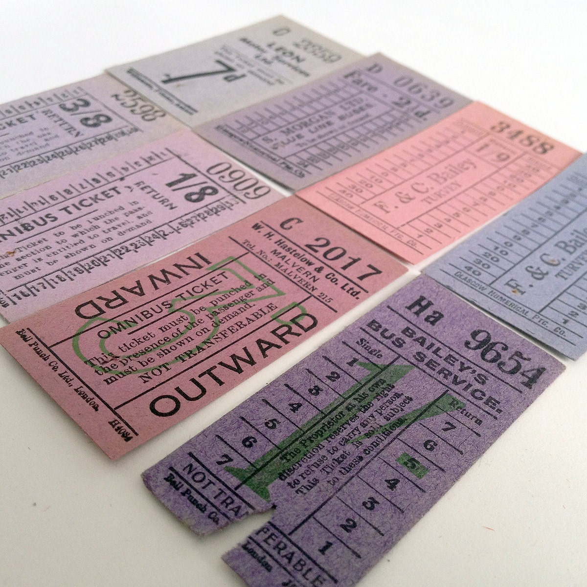 Vintage British tickets, set in pink and violet colour hues - vintagecuriosityshop