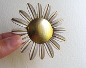 Vintage daisy locket brooch, Signed by Avon, gold and white enamel flower pin