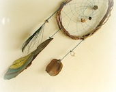 Baby mobile - dream catcher apache tear shaped with painted tree bark and a peacock feather