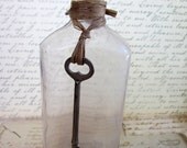 Vintage Antique Medicine Bottle with Skeleton key