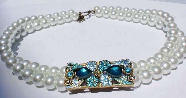 Two strand pearl necklace with slider antique brass plated aqua and toggle clasp