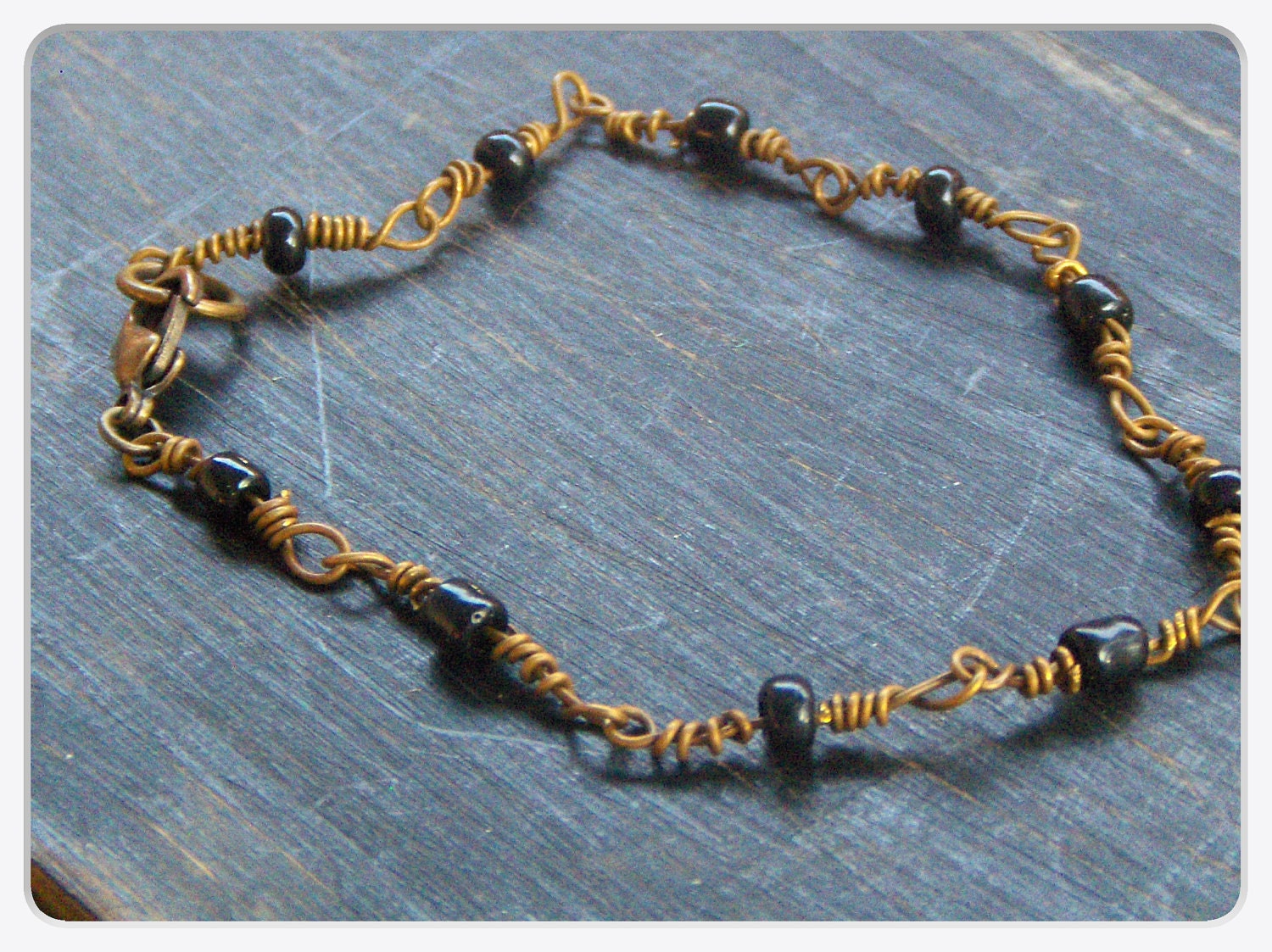 Noir. Handwrapped Antiqued Brass and Glass Bracelet