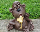 Ceramic Monkey eating a banana