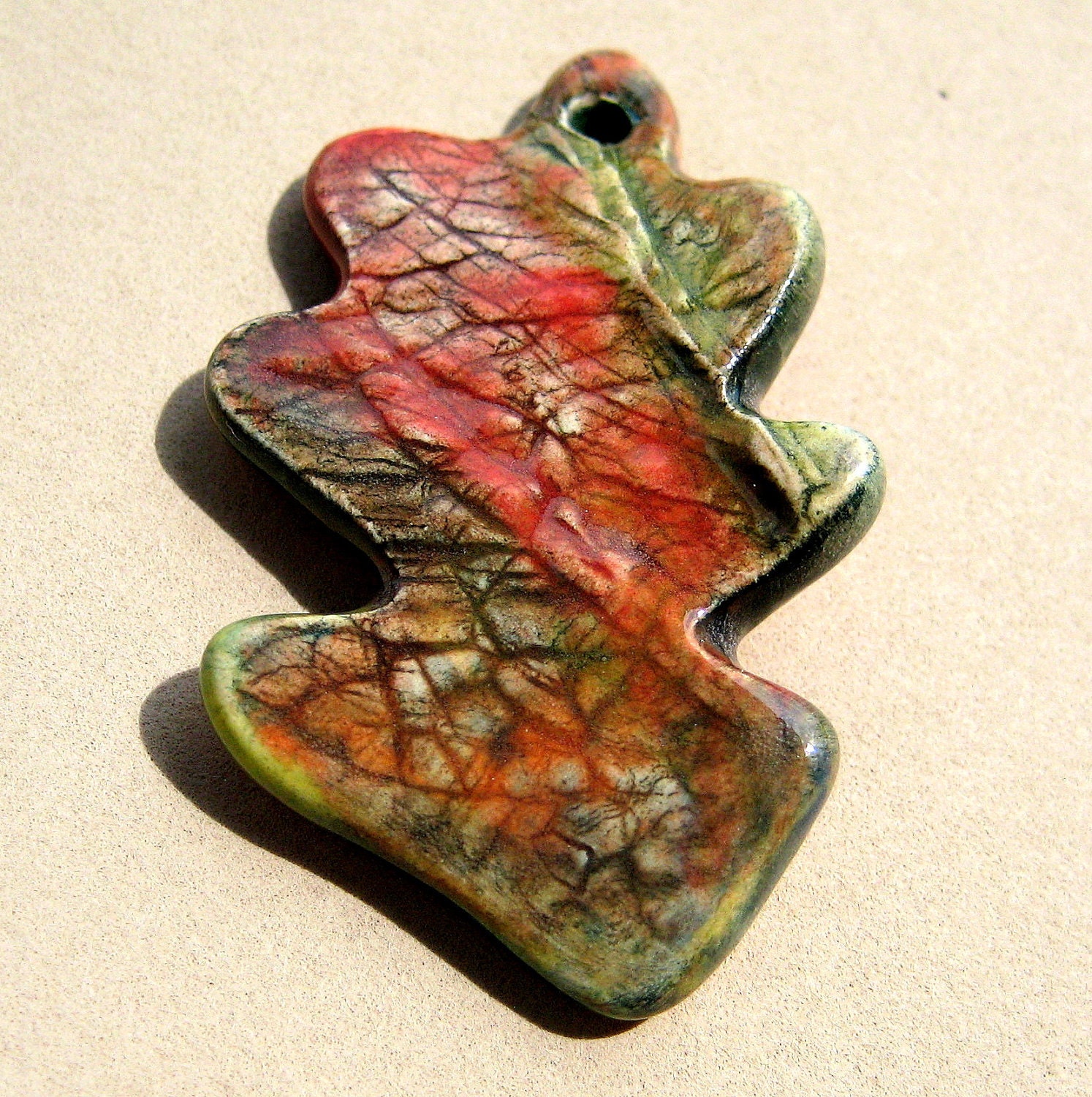 Handmade Ceramic  Pendant Oak Leaf Reds and Greens