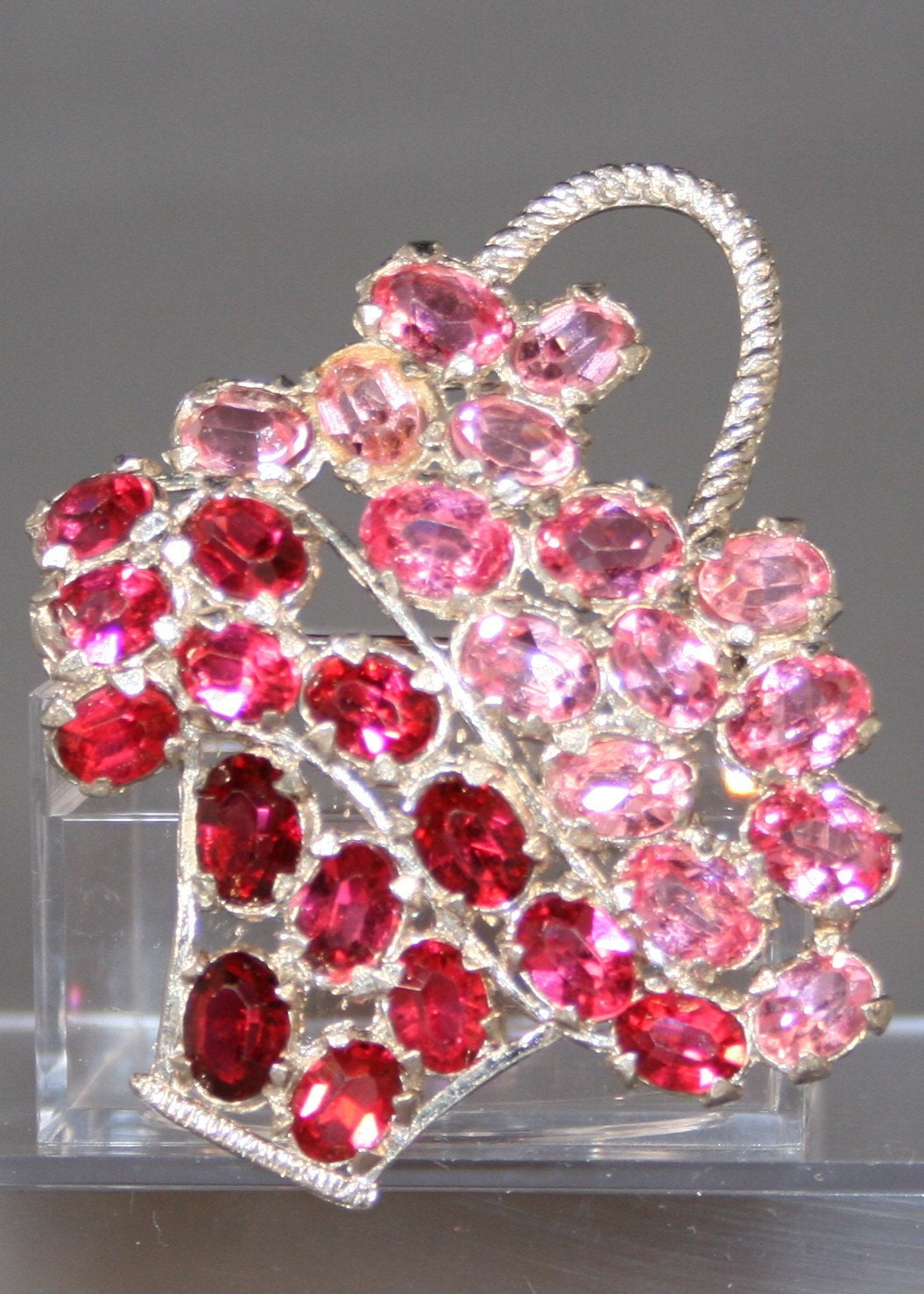 Vintage rhinstone flowerbasket brooch in shades of pink