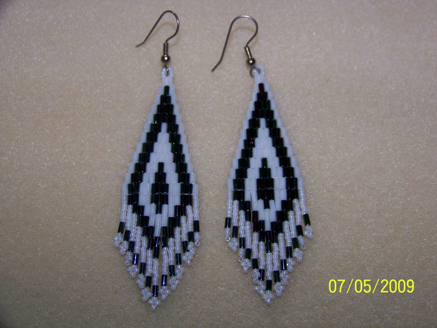 White and metallic peacock brick stitch earrings