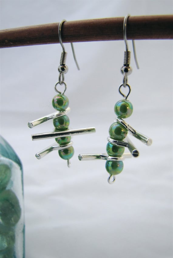 Green Ladder Earrings: green glass alternating with silver-plated bars that swing wildly