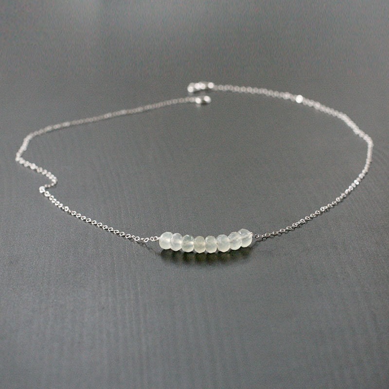 heron - silver and light green necklace by elephantine