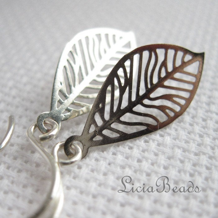 Disintegrate - silver veined leaf earrings