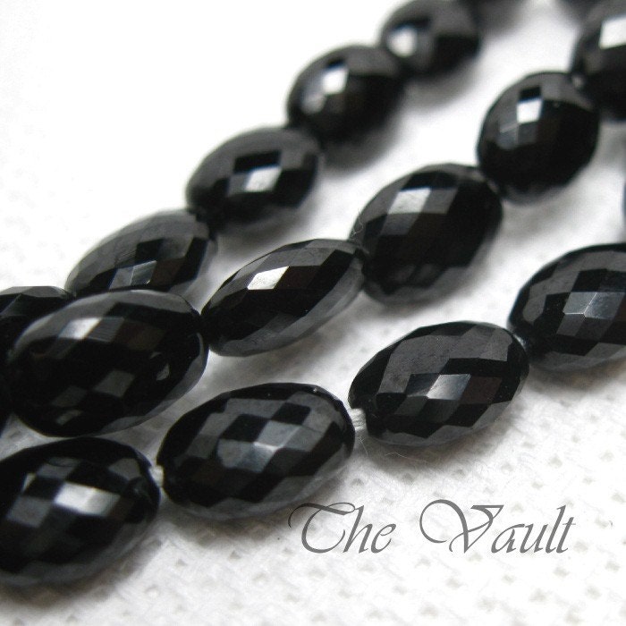 4 Black Spinel 9-10mm faceted flattened oval beads