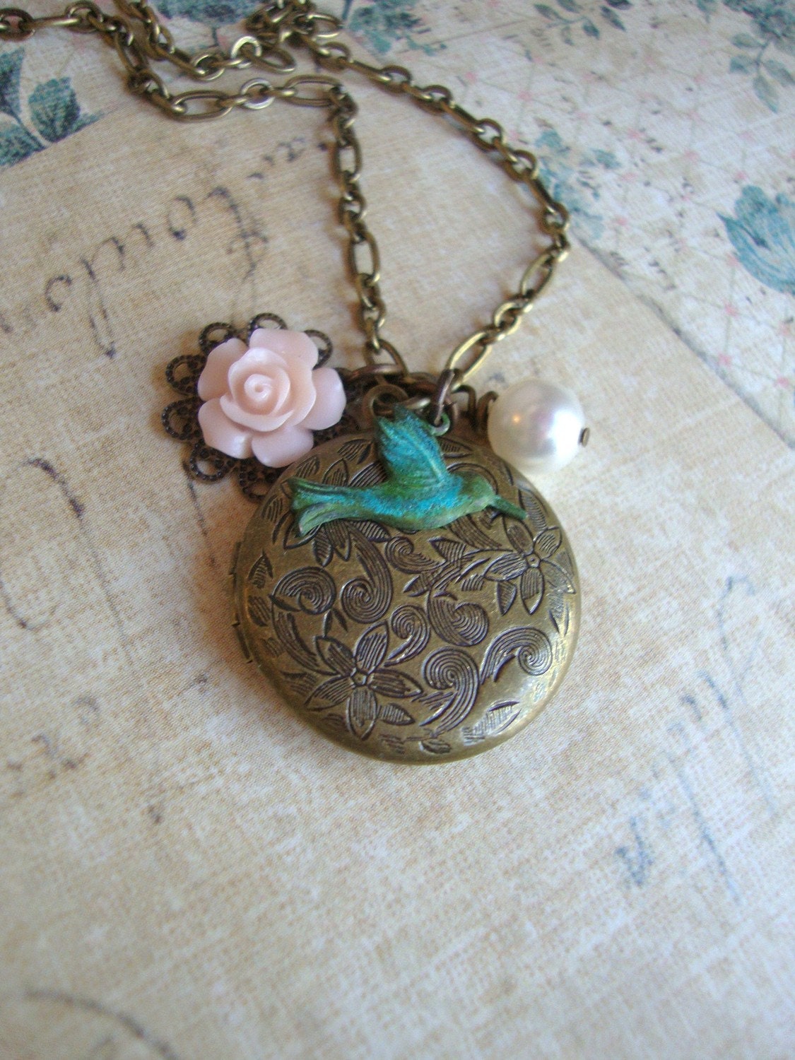 Mouseover the photos Hummingbird Locket Necklace