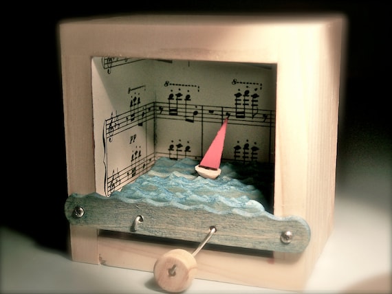 sailboat automaton in music note box