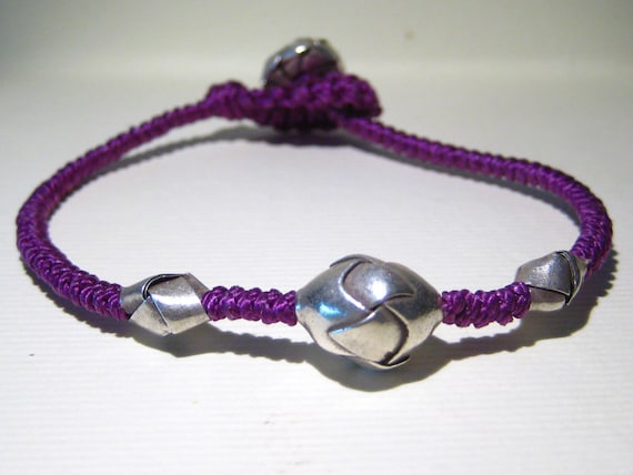 knotted bracelet, with elements of Karen silver origami