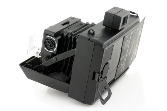 Polaroid The Reporter SE Camera Includes Original Timer and Neck Strap