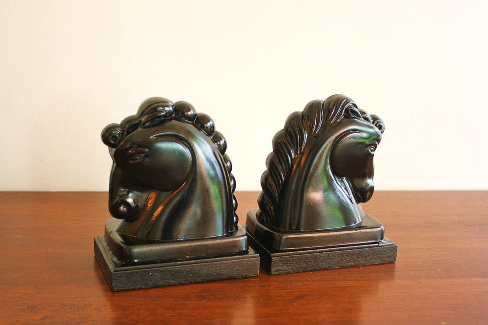 Pair of vintage black horse head bookends, Hollywood Regency