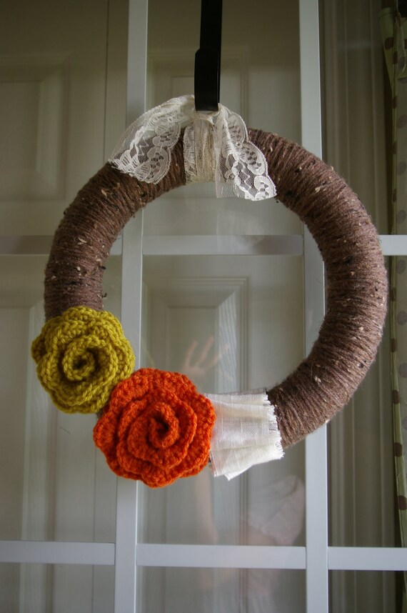 Warm autumn wreath with beautiful crocheted flowers