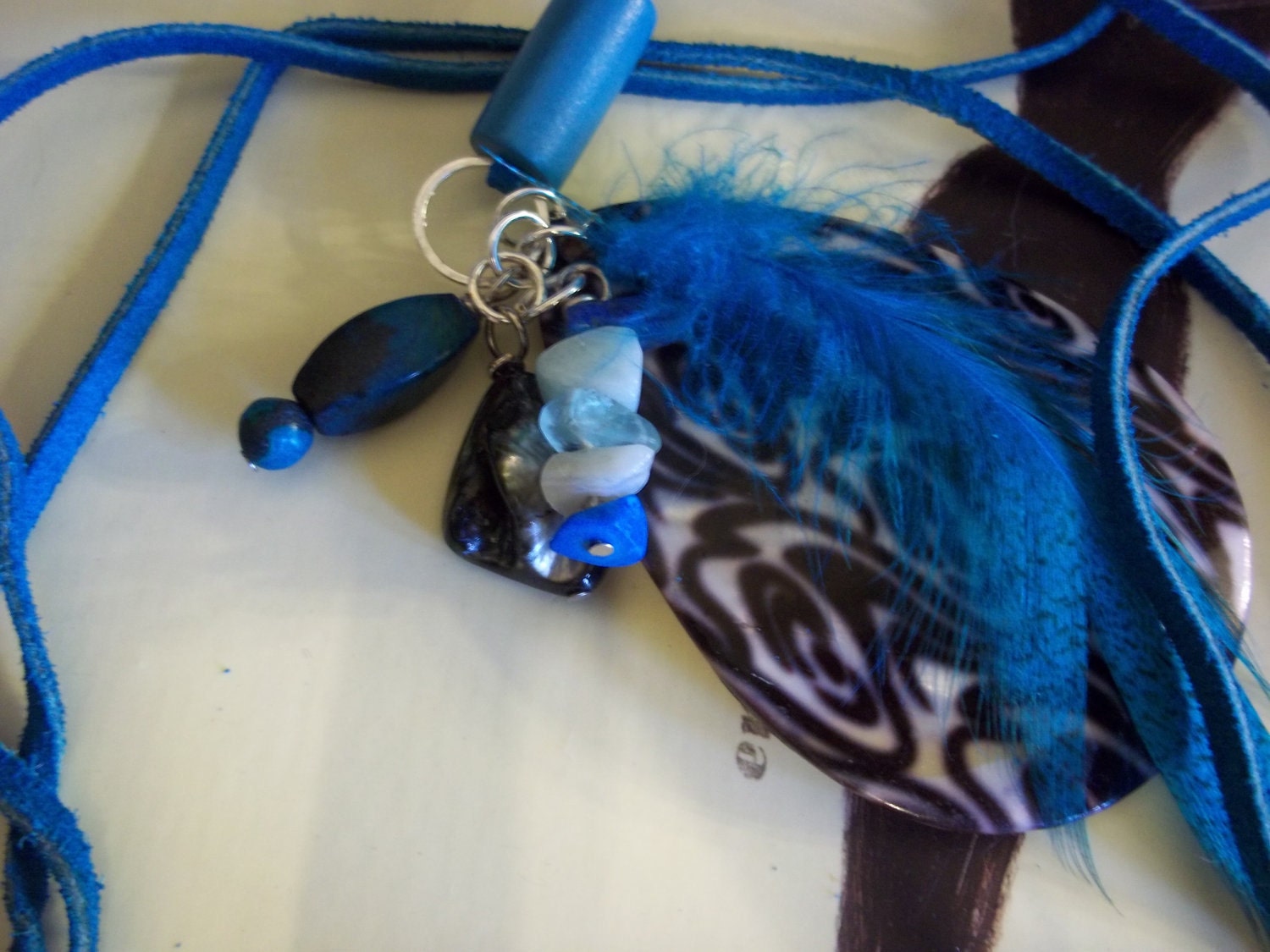 feather, suede,  shell, pearl and stone necklace natural