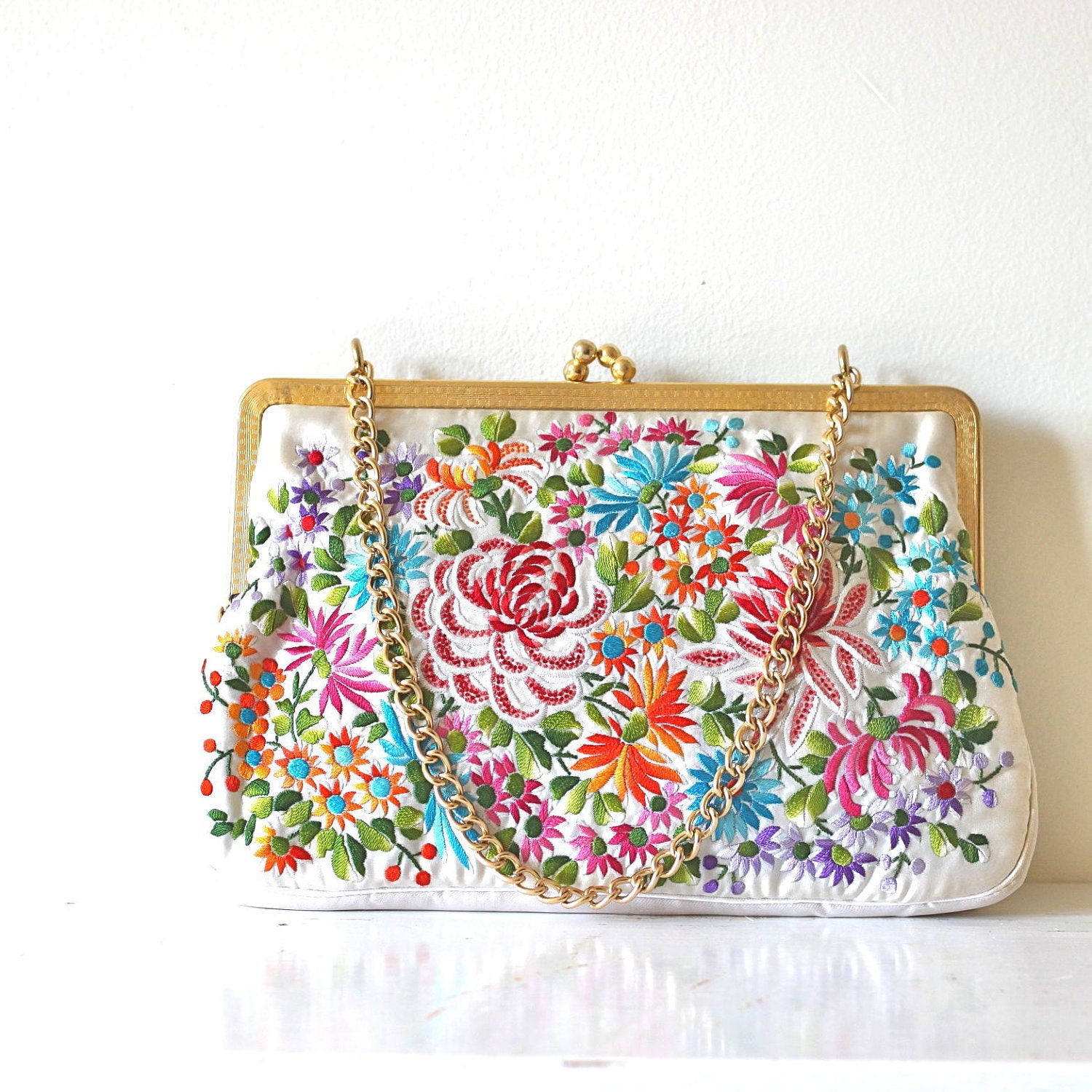 vintage FOLK FLORL satin clutch.