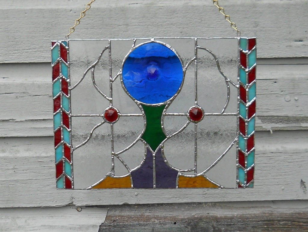 Victorian Based Stained Glass Suncather with Red Glass Gems and a Blue Rondel