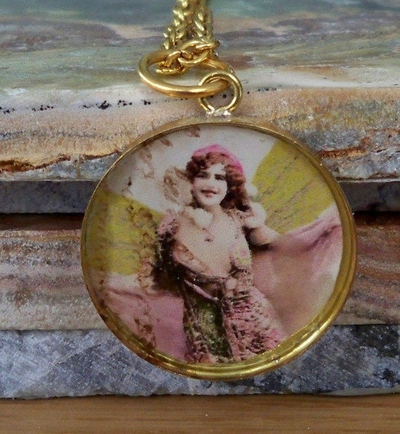 Handmade Vintage Green Winged Fairy in Ice Resin necklace