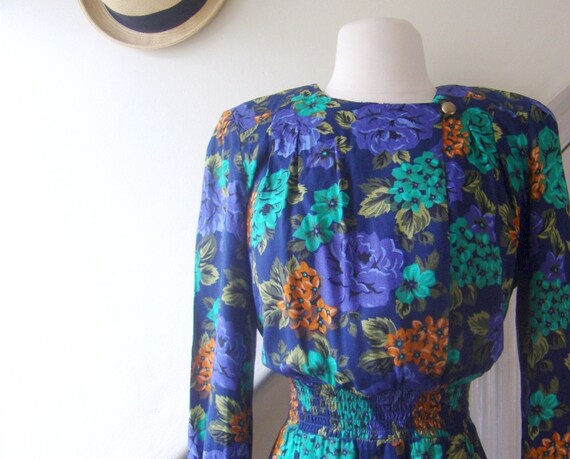 dark floral dress with golden collar button and loose flowing skirt / 1980s / s/m