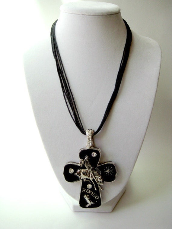 RIDE 'EM COWGIRL: Rodeo cowgirl magnetic cross pendant on leather cord necklace