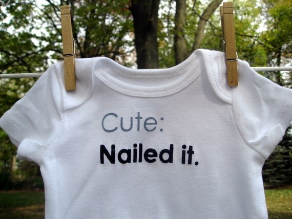 cute. nailed it.  --- white onesie, size 0 to 3 months