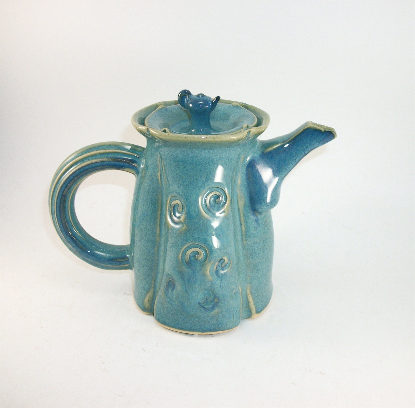 small turquoise teapot