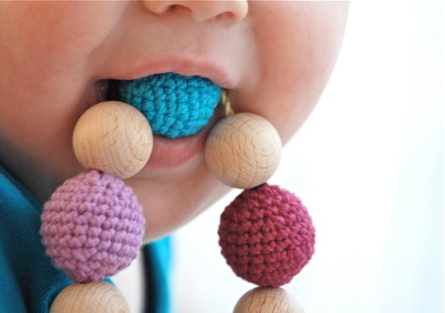 Teething toy with crochet wooden beads.